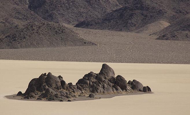 The Grandstand, a natural rock monolith | Racetrack Playa - Racetrack Valley Rd | Secret World Trip Planner