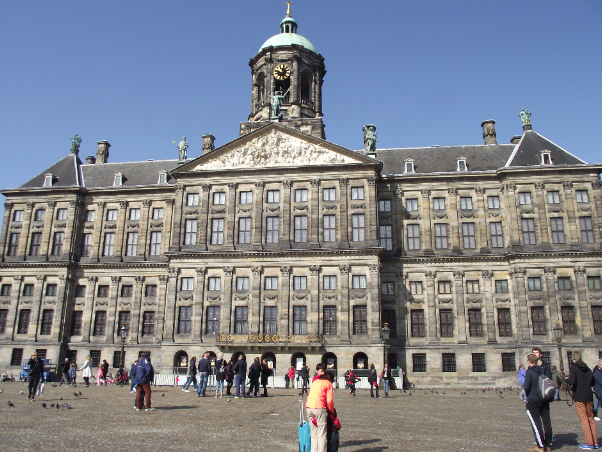 Between the Royal Palace and the New Church (Nieuwe Kerk) - Amsterdam | Secret World Trip Planner