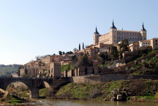 The Puente de San Martín, a medieval bridge ont Tagus - Toledo | Secret World Trip Planner