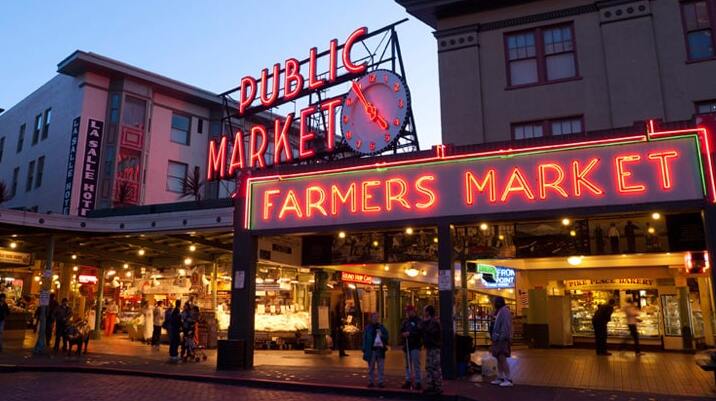 Pike Place Market - uno de los mercados públicos de granjeros más antiguos de los Estados Unidos. - Seattle | Secret World Trip Planner