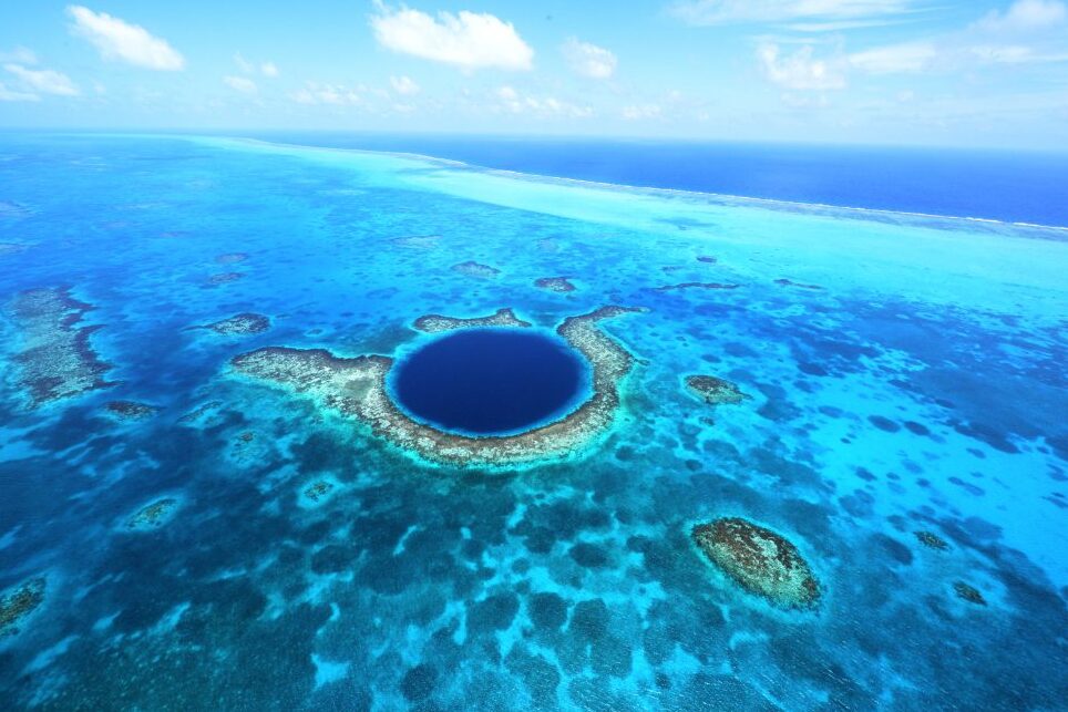 Great Blue Hole in the heart of the Lighthouse Reef - Belize City | Secret World Trip Planner