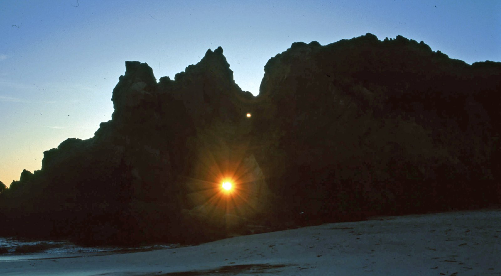 The Pfeiffer Keyhole Rock - Pfeiffer Beach | Secret World Trip Planner