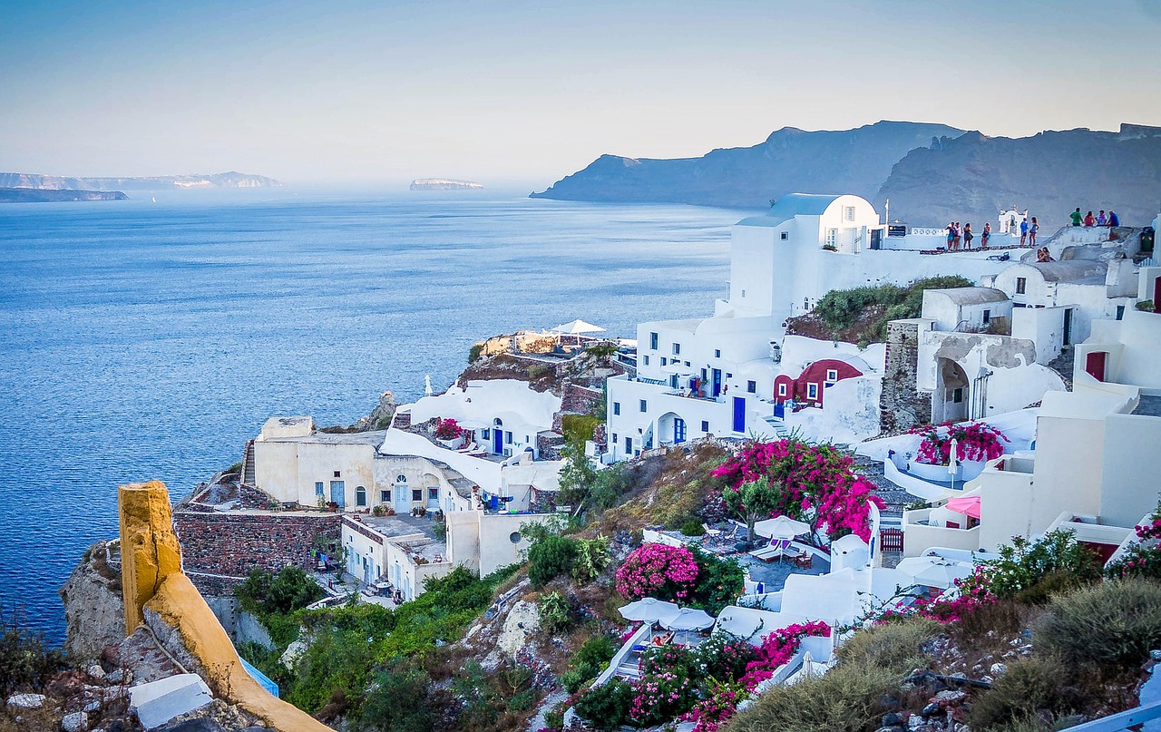 The Enchanting Allure of Oia: A Symphony of Light, Beauty, and Joy in Santorini - Oia | Secret World Trip Planner