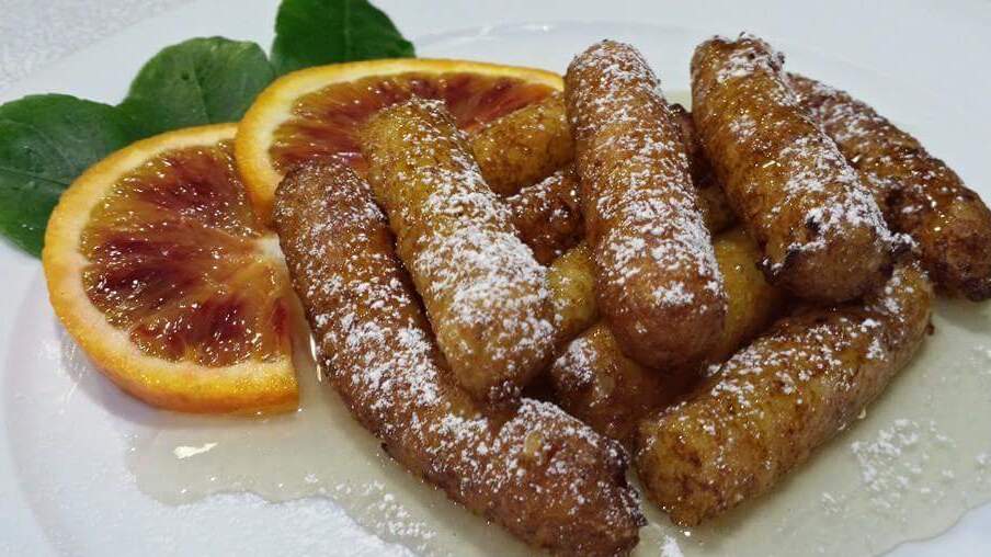 Le crespelle di riso catanesi, o “zeppole di riso” - Catania | Secret World Trip Planner