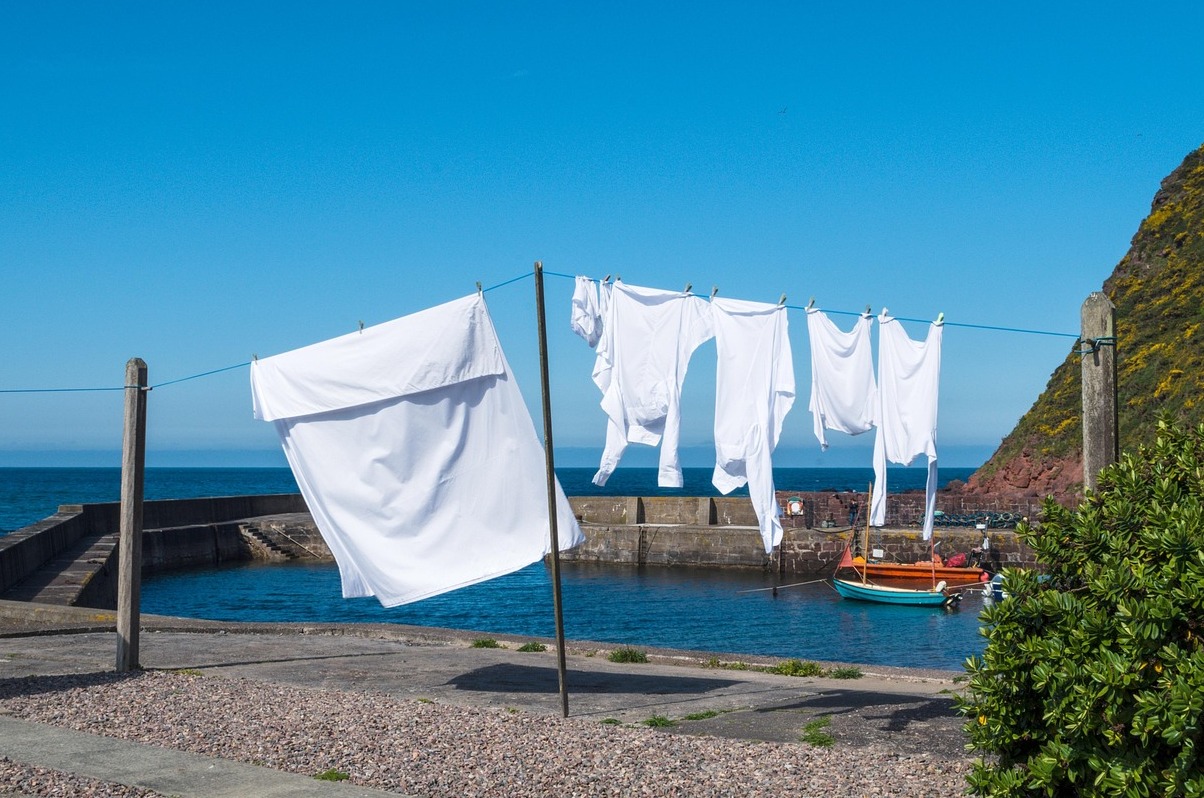 Nestled at the foot of imposing cliffs: Pennan - Pennan | Secret World Trip Planner