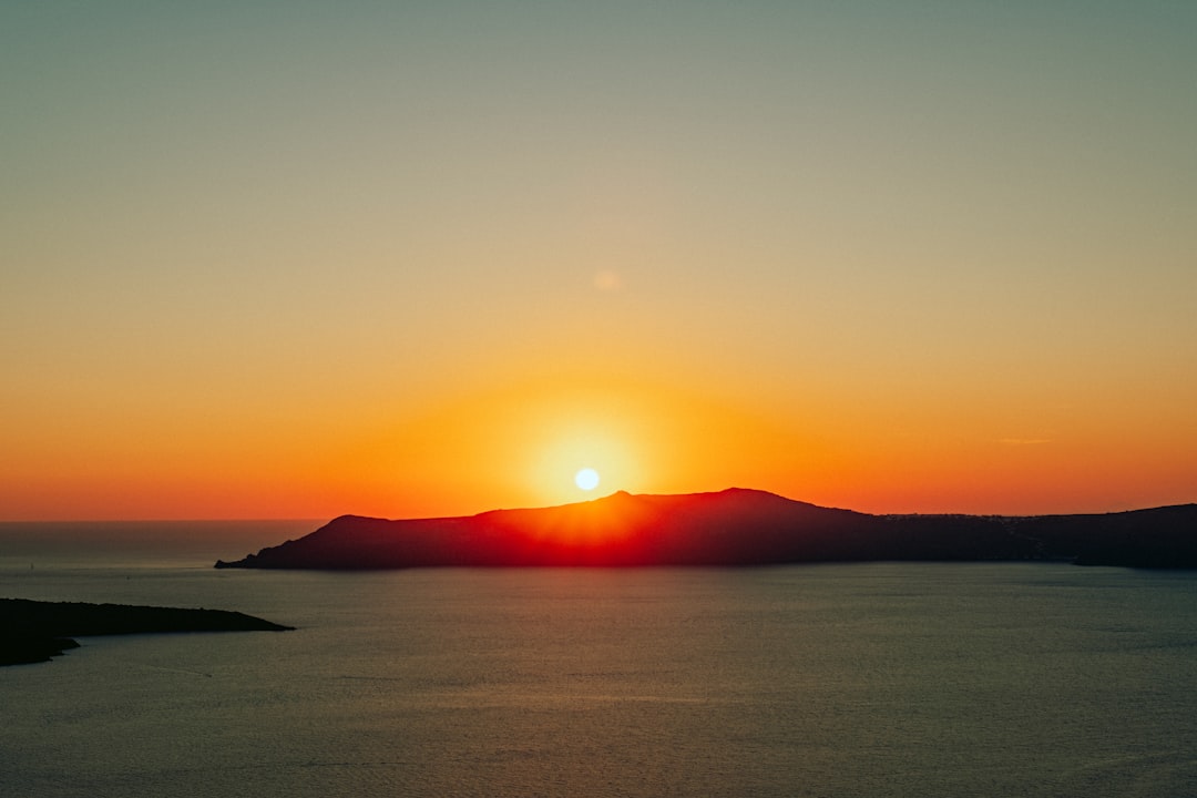 Dreamy Sunsets in Santorini: The Magic of Oía - Nik. Nomikou | Secret World Trip Planner