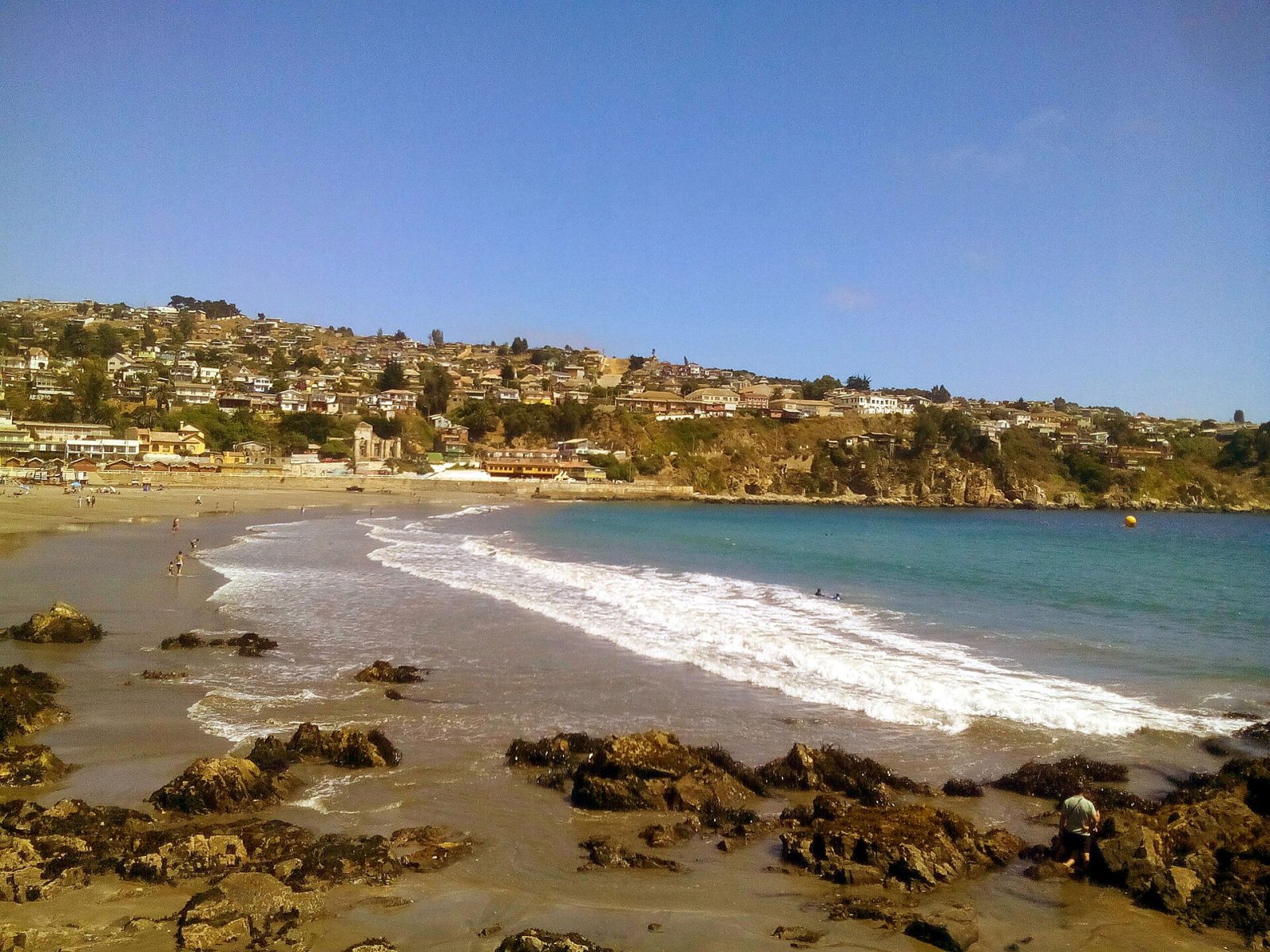 Scopri Playa Chica: una gemma della costa cilena - San Antonio | Secret World Trip Planner