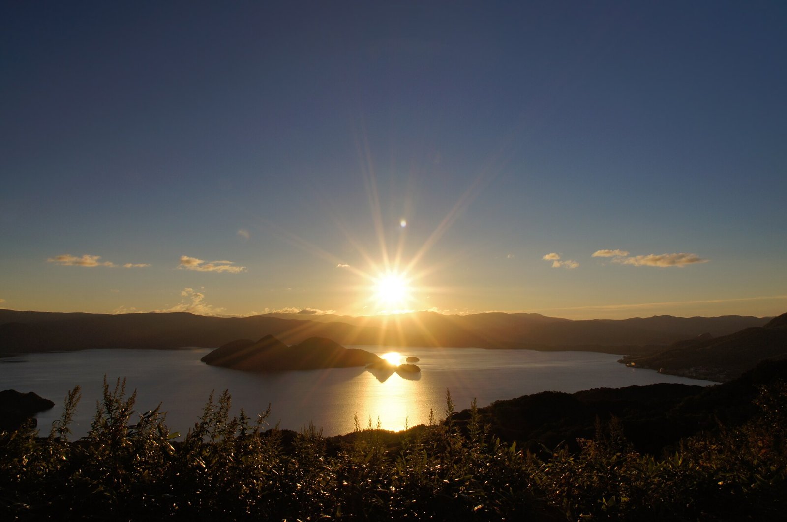 Scopri il Lago Toya: un gioiello della natura in Giappone - Toyako | Secret World Trip Planner