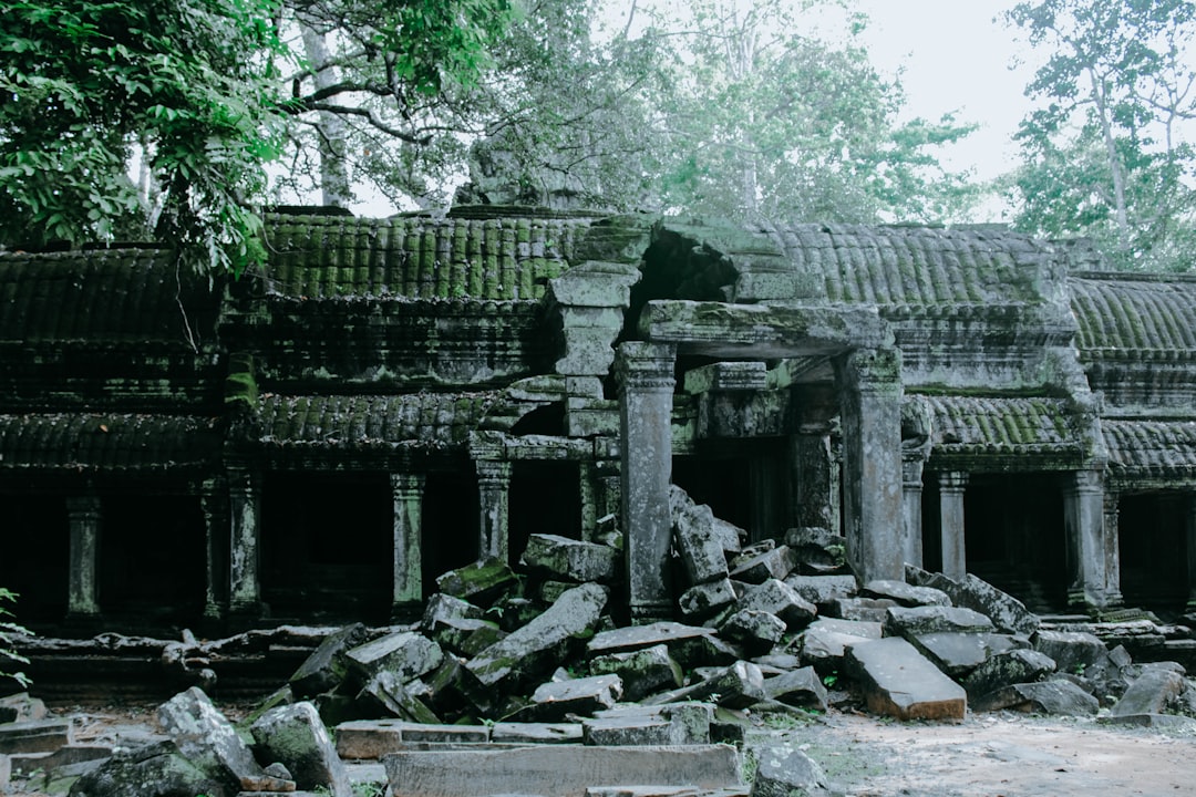 Angkor Wat at Dawn: Towers in Mist and Reflections — Wat Po