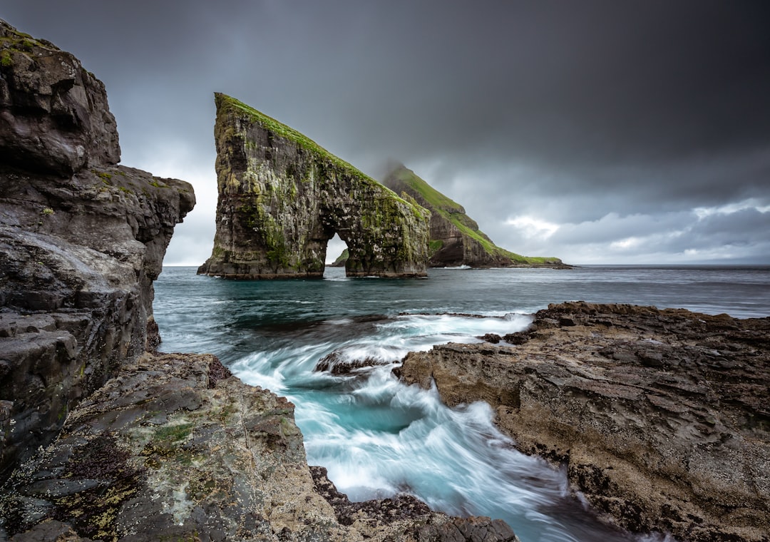 Drangarnir: Faroese Rock Arches at Sunset - 3HGP+69 | Secret World Trip Planner