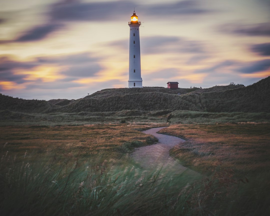 Lyngvig Lighthouse: Between Dunes and North Sea - Holmsland Klitvej 109 | Secret World Trip Planner