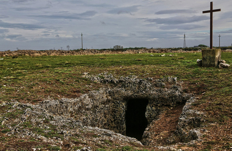 Ancient underground crypt, dug into the tuffaceous bank by ancient monks at a depth of two metres. — Nardò