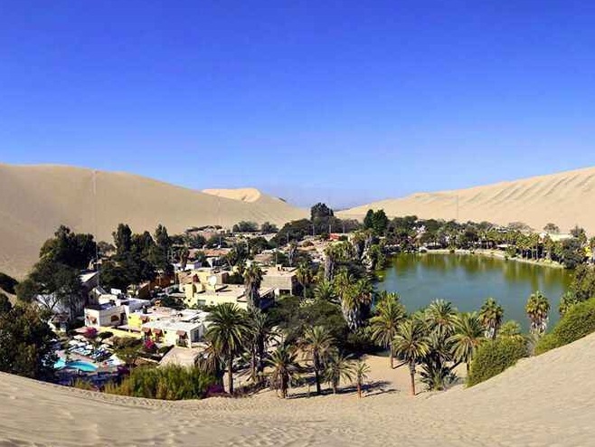 Escondite en un pequeño oasis rodeado de dunas en Huacachina, Perú
En el suroeste - Huacachina | Secret World Trip Planner