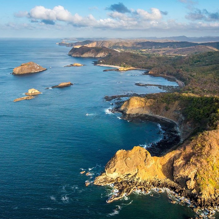 The emerald coast of Guacalito De La Isla, Nicaragua - Carretera Tola | Secret World Trip Planner